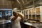 chef twirling romali roti dough