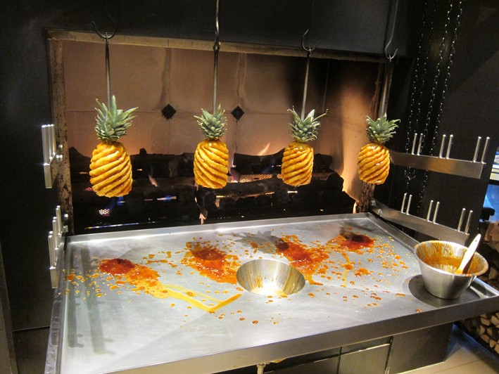 pineapples being roasted