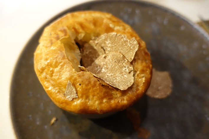 soup with white truffle over pastry