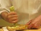 wasabi root being grated